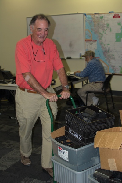 Bob helping to move a pile of radios that we just sold.