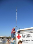 Doug, KI4RHU, puts a Motorola repeater on top of our trailer for race staff and organizers. We were happy to help them out!